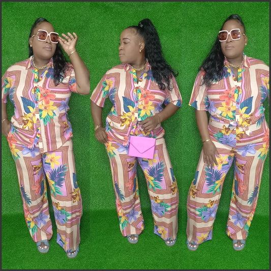 Three women wearing colorful matching outfits on a green background